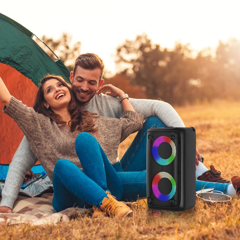 Wireless Bluetooth speaker with dual speakers and RGB lighting to enhance the atmosphere of the venue. Moderate size, portable and lightweight, supports microphone connection, and has FM radio function, suitable for family gatherings and outdoor use.